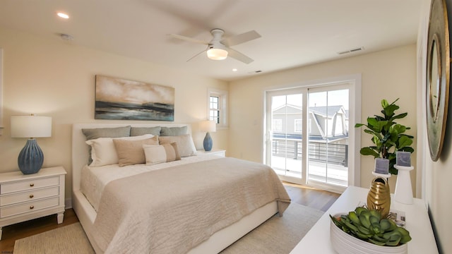 bedroom featuring visible vents, ceiling fan, wood finished floors, recessed lighting, and access to exterior