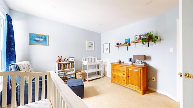 carpeted bedroom with baseboards