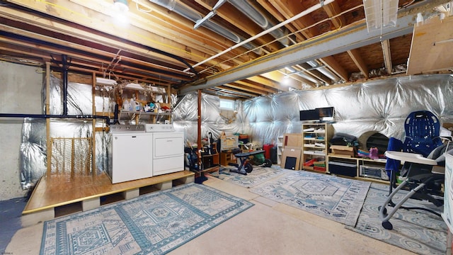 unfinished basement with independent washer and dryer