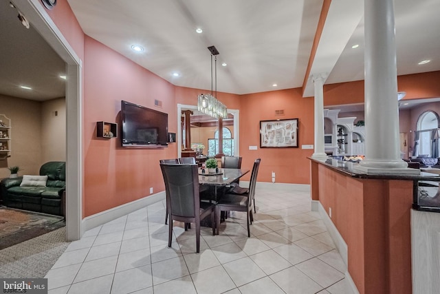 dining area with light tile patterned floors, decorative columns, baseboards, and recessed lighting