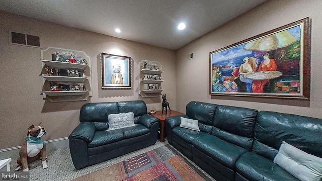 cinema room featuring recessed lighting and visible vents