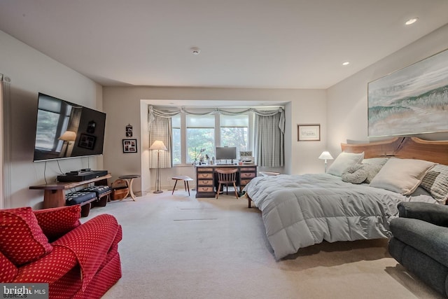 carpeted bedroom featuring recessed lighting