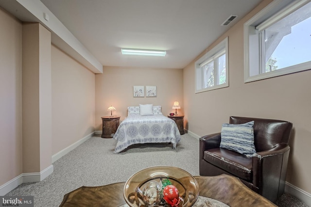 bedroom with carpet and baseboards