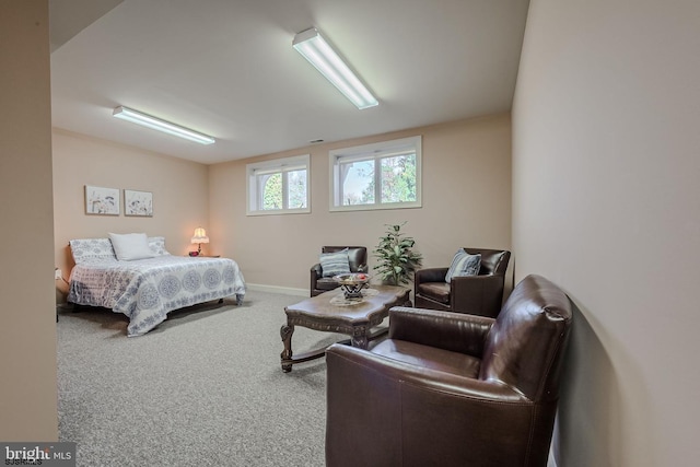 bedroom featuring carpet flooring and baseboards