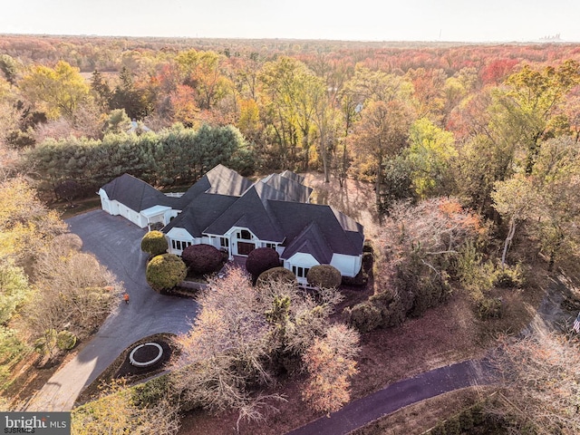 aerial view featuring a view of trees