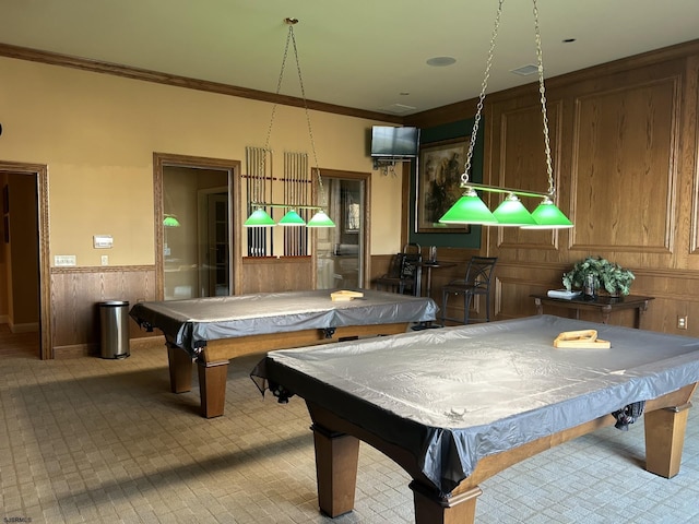 rec room featuring a wainscoted wall, ornamental molding, pool table, and wood walls