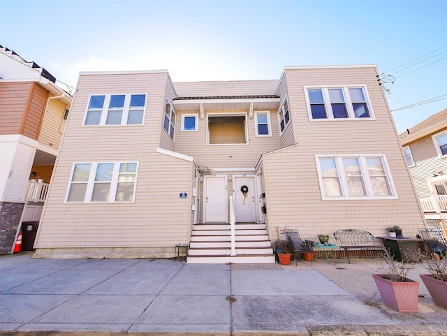 multi unit property featuring a patio area