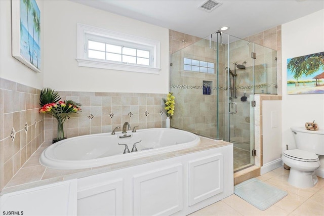 full bath with tile patterned flooring, visible vents, toilet, a garden tub, and a stall shower