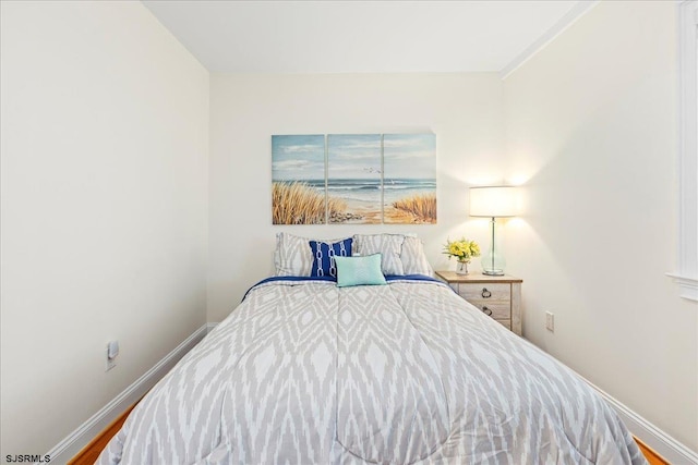 bedroom featuring baseboards