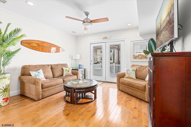 living room featuring visible vents, recessed lighting, light wood finished floors, baseboards, and ceiling fan