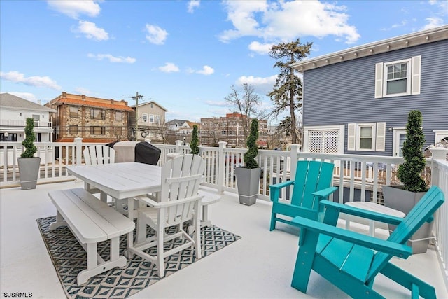 view of patio featuring outdoor dining area