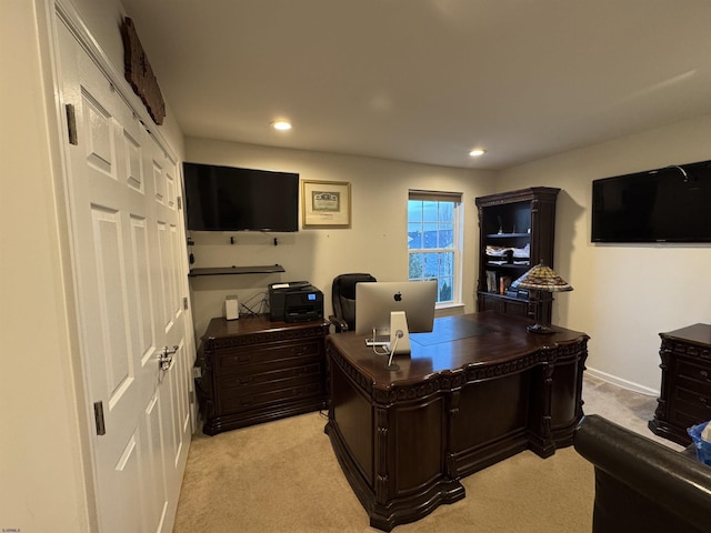 home office featuring light carpet, recessed lighting, and baseboards