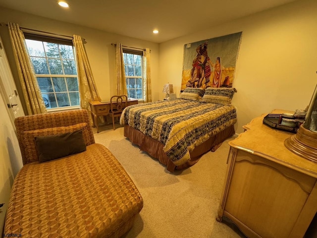 bedroom featuring recessed lighting and light carpet