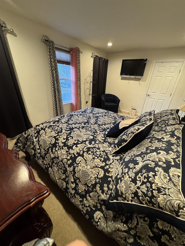 bedroom with recessed lighting and carpet