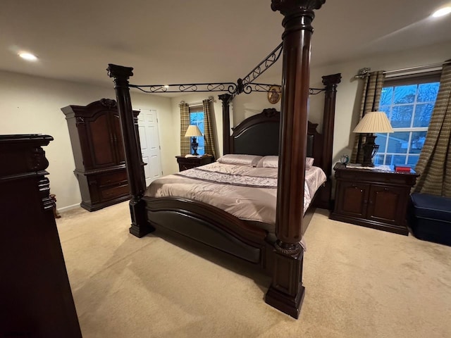 bedroom featuring recessed lighting and light colored carpet