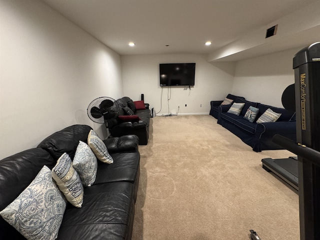 living room with recessed lighting, visible vents, baseboards, and carpet