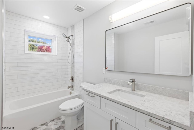 bathroom featuring visible vents, toilet, bathtub / shower combination, and vanity