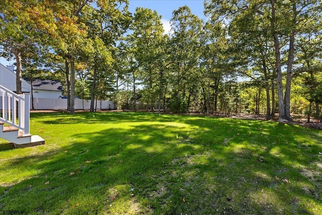 view of yard with fence