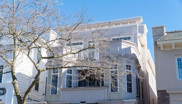 exterior space featuring stucco siding