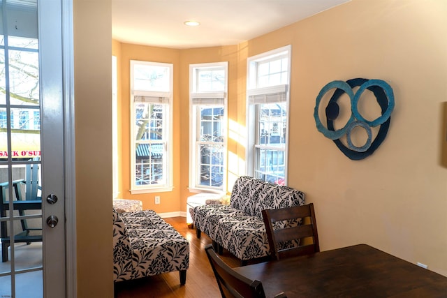 sitting room with recessed lighting, baseboards, and wood finished floors