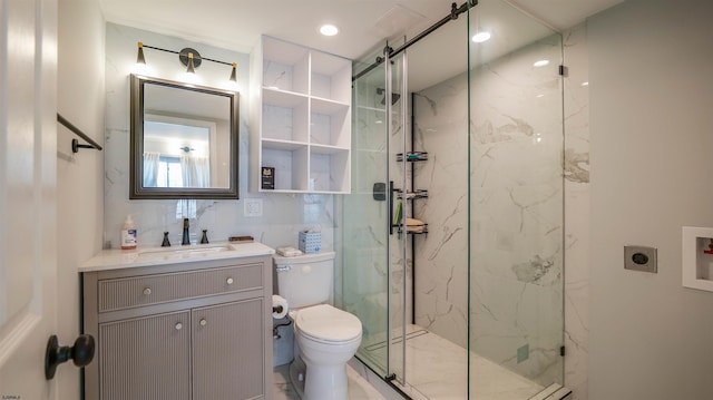 bathroom featuring toilet, backsplash, a marble finish shower, tile walls, and vanity