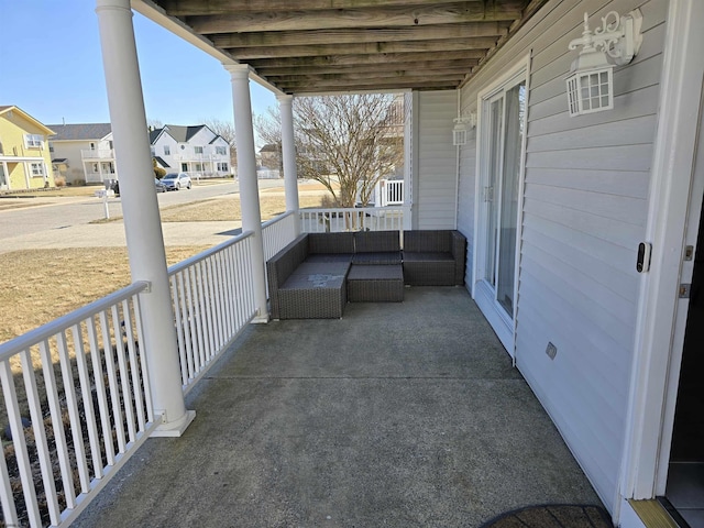 view of patio / terrace featuring a residential view