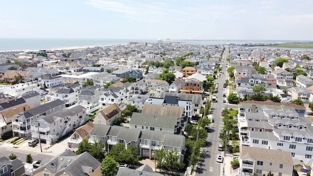 aerial view featuring a residential view and a water view