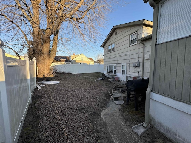 view of yard featuring a fenced backyard