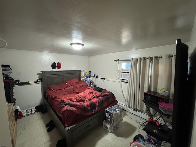 bedroom featuring tile patterned floors