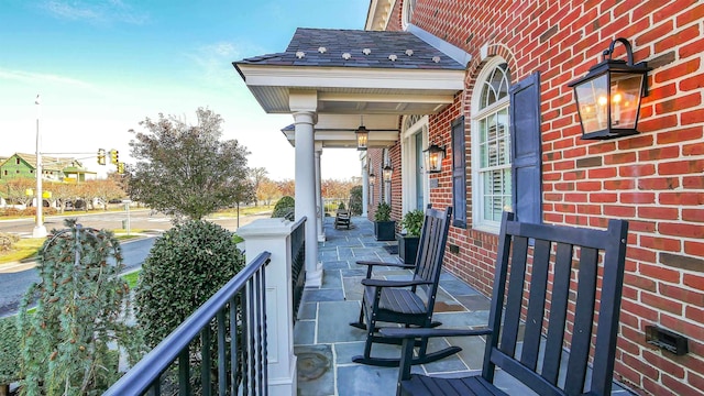 balcony featuring a porch