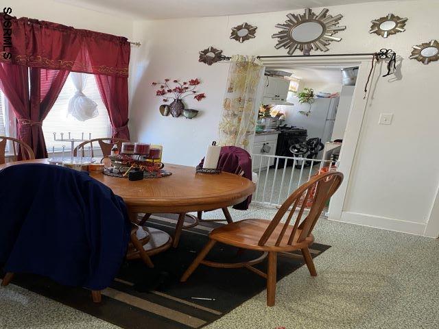 dining room with baseboards