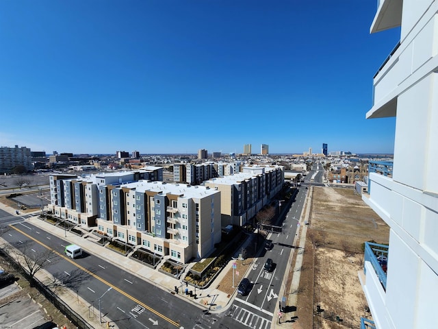 birds eye view of property featuring a view of city