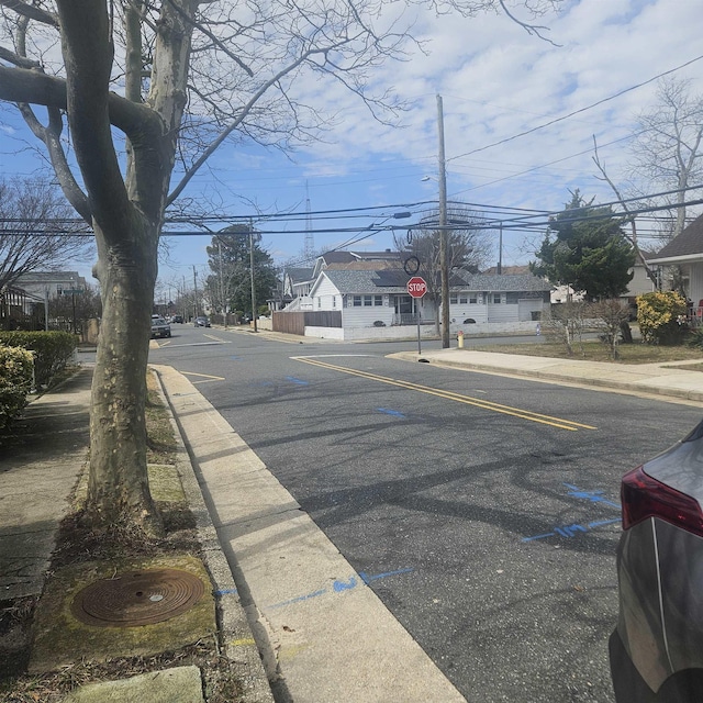 1428 Madison Ave, Venice Park, NJ 08401 - view of street featuring traffic signs, curbs, sidewalks, and a residential view