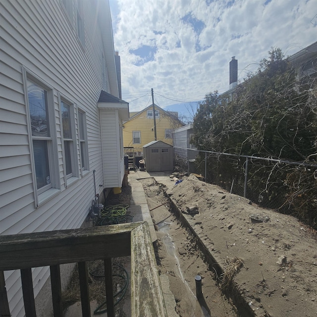 1428 Madison Ave, Venice Park, NJ 08401 - view of yard featuring a storage shed, an outdoor structure, and fence