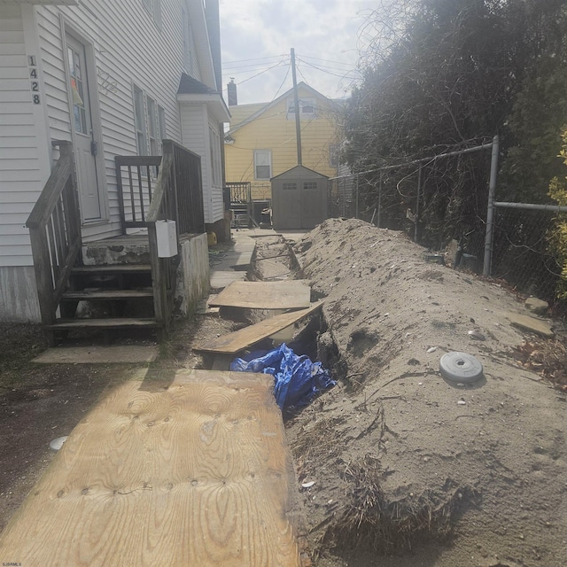 1428 Madison Ave, Venice Park, NJ 08401 - view of yard featuring an outbuilding, fence, and a shed