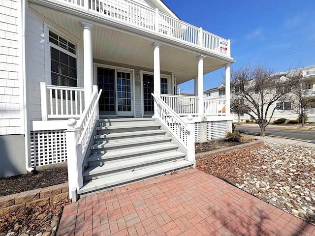 doorway to property featuring a porch