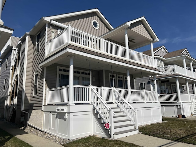 townhome / multi-family property with a porch