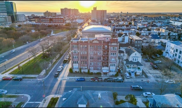 aerial view at dusk with a city view