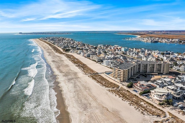 aerial view featuring a beach view and a water view