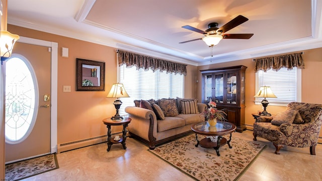 living area with baseboard heating, crown molding, a raised ceiling, and ceiling fan