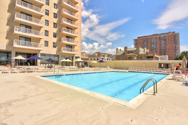 community pool featuring a patio