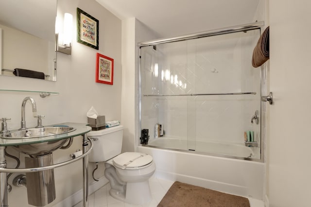 full bathroom with tile patterned flooring, enclosed tub / shower combo, toilet, and a sink