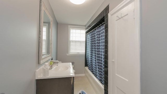 full bathroom featuring vanity, shower / bath combination with curtain, and tile patterned flooring