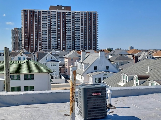 exterior space with a residential view and central AC unit