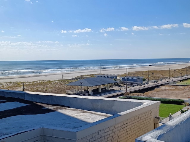 property view of water featuring a beach view