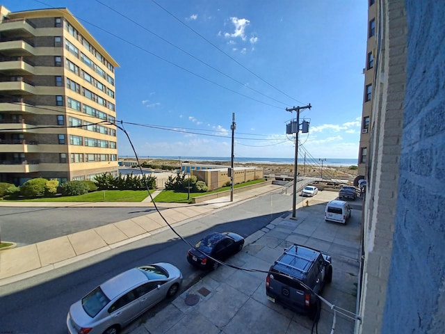 view of street featuring curbs and sidewalks