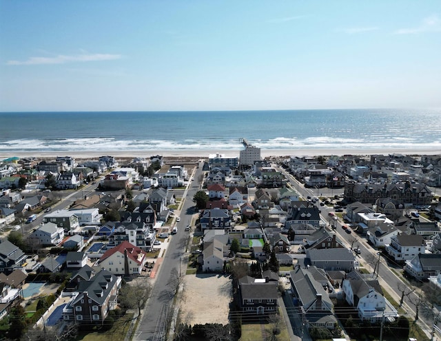 aerial view with a residential view and a water view