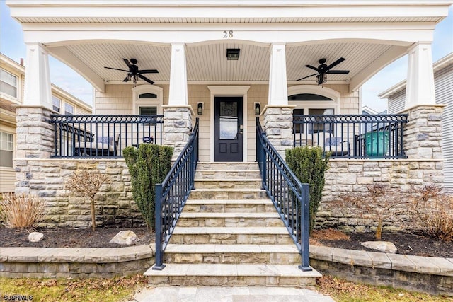 property entrance featuring covered porch and ceiling fan