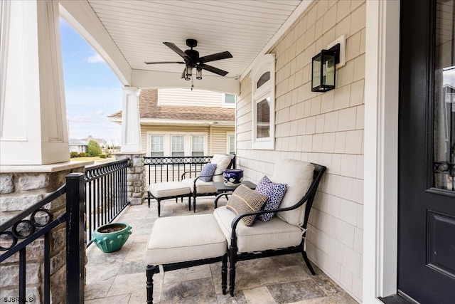 view of patio with a ceiling fan and covered porch