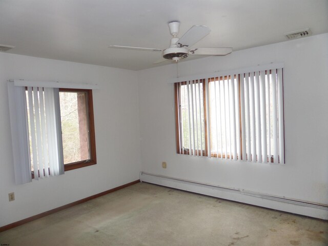 78 Tyler Rd, Greenfield, NJ 08230 - carpeted spare room featuring visible vents, baseboards, a ceiling fan, and a baseboard radiator